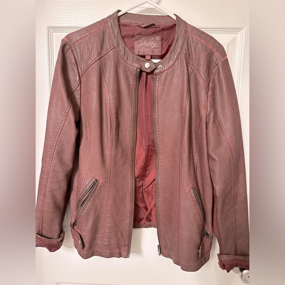 Burgundy jacket.